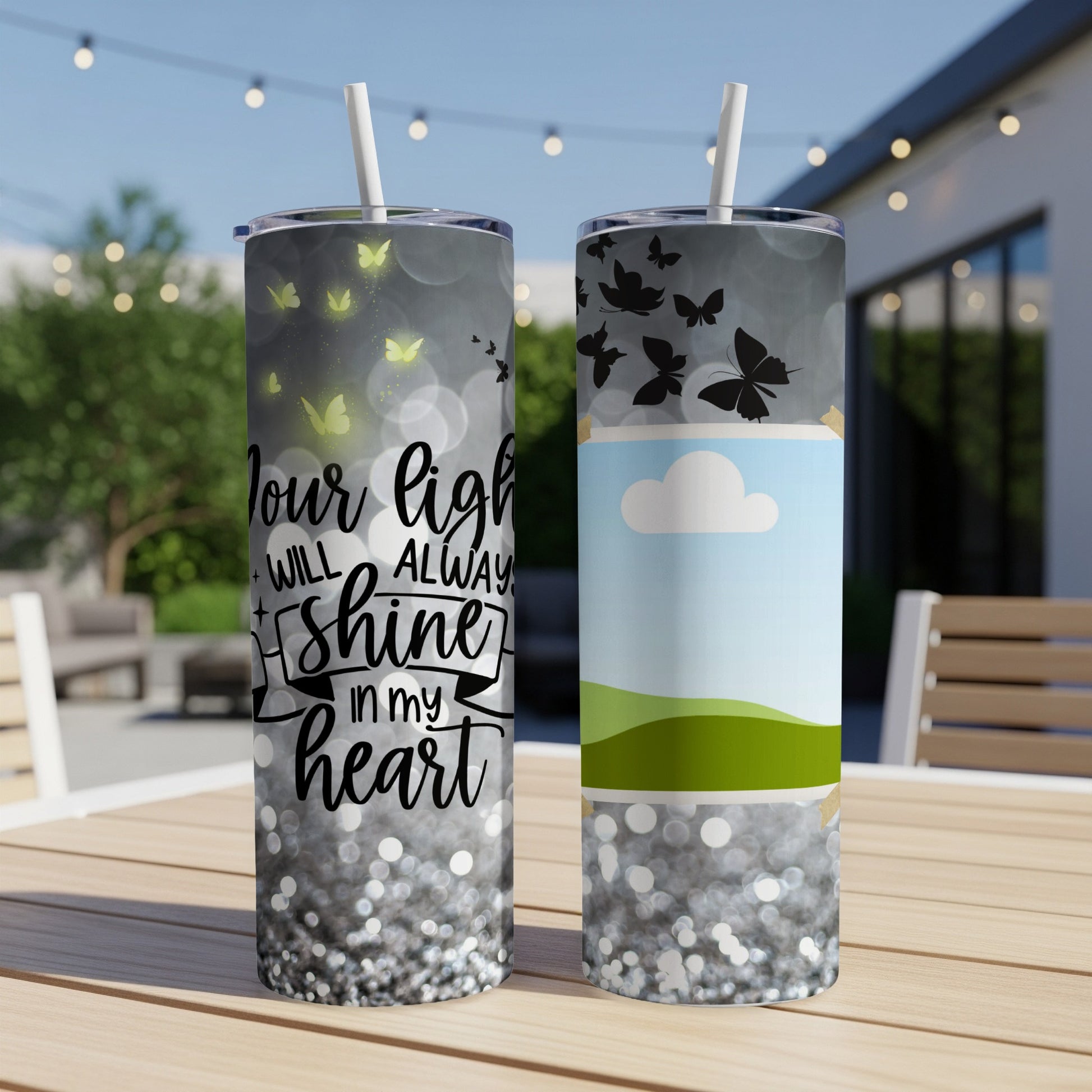 Two tumblers with butterflies, one featuring text "Your light will always shine in my heart".
