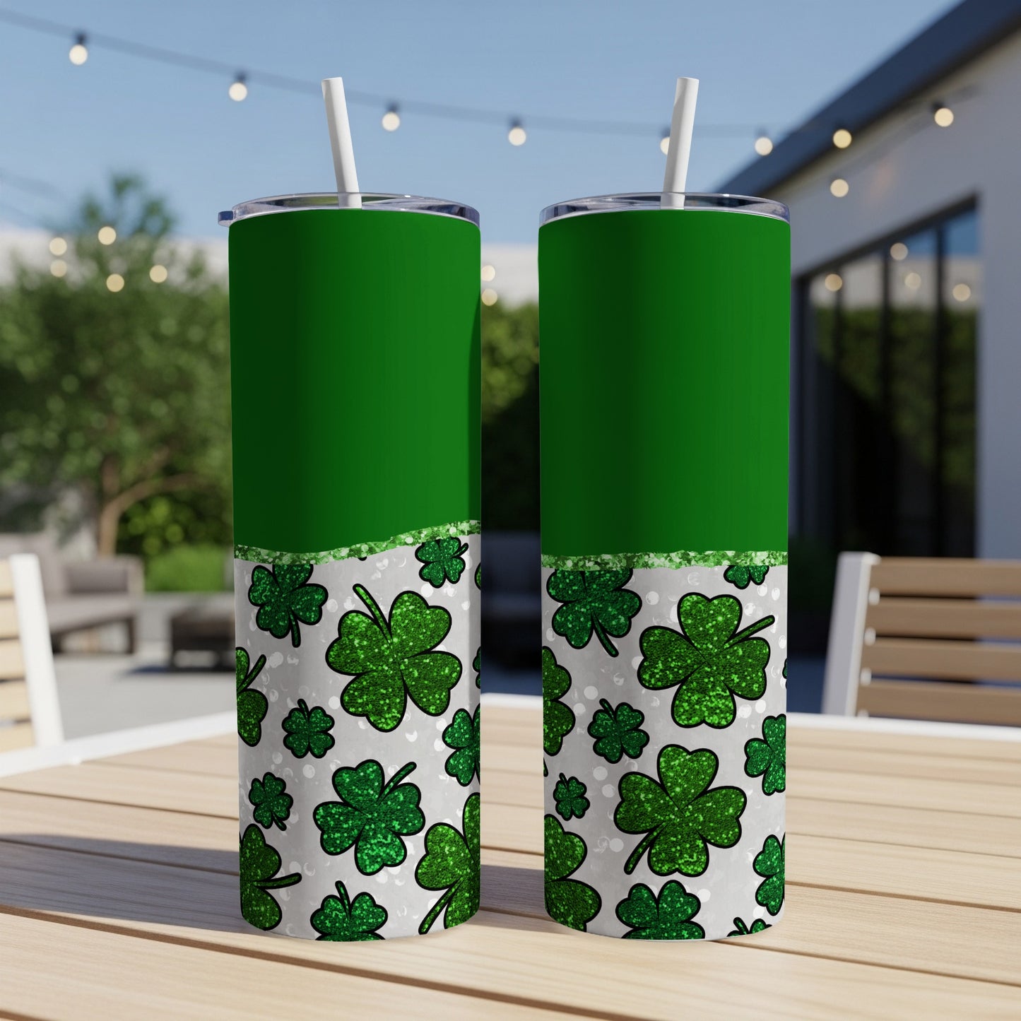 Two green tumblers with shamrock pattern and glitter accents.