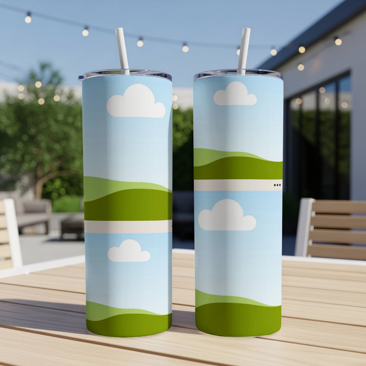Two tumblers with a sky, cloud, and rolling green hill pattern.