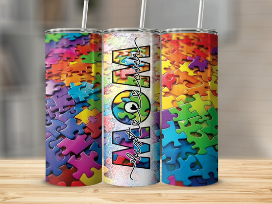 Three tumblers with rainbow puzzle pieces and "Autism Mom" text.