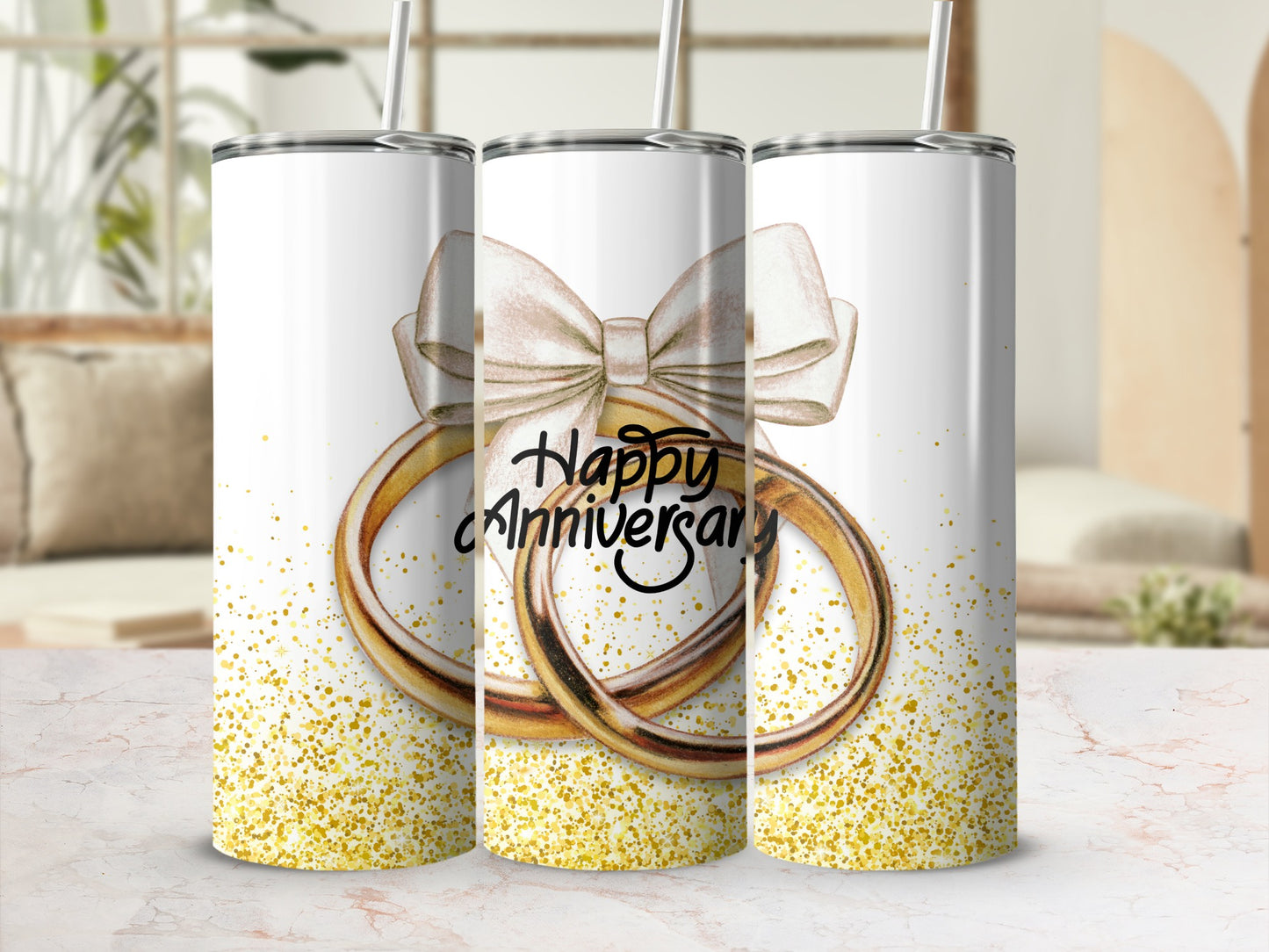 Three anniversary tumblers with gold rings and "Happy Anniversary" text.