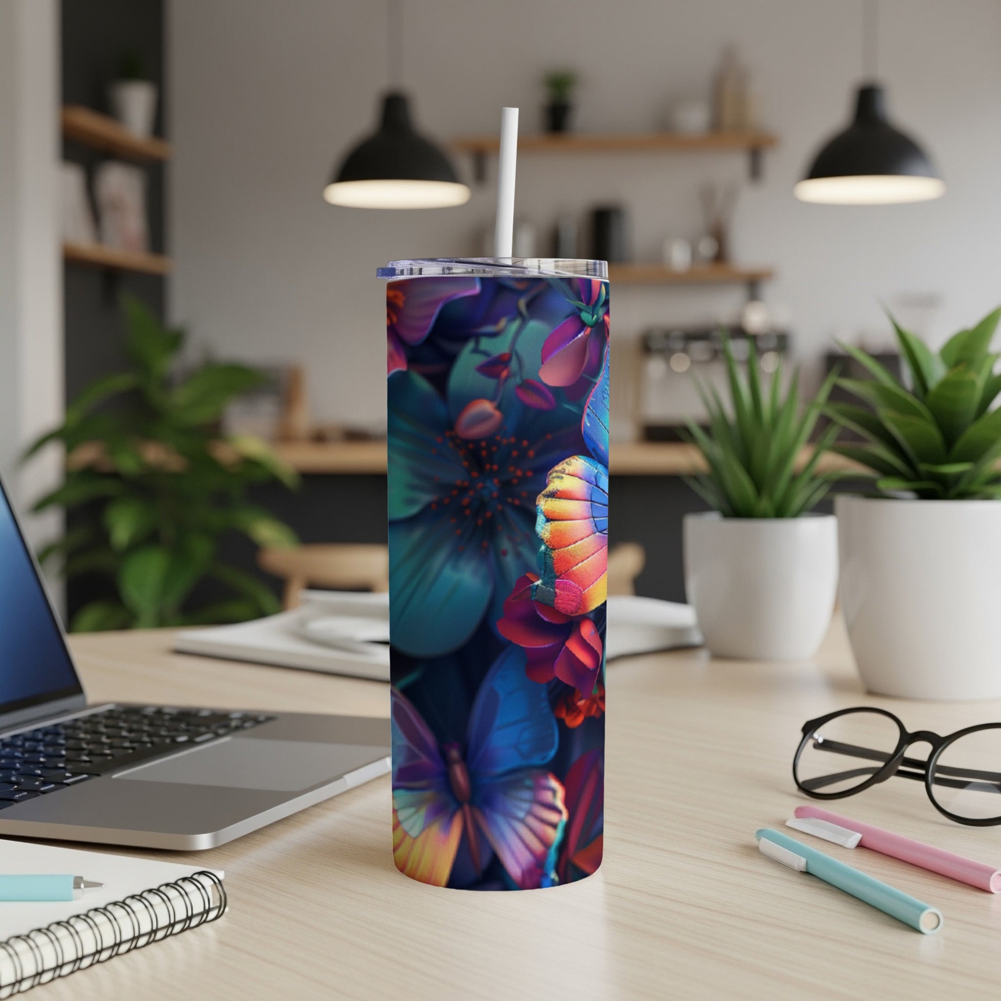 Tumbler with vibrant floral and butterfly design.