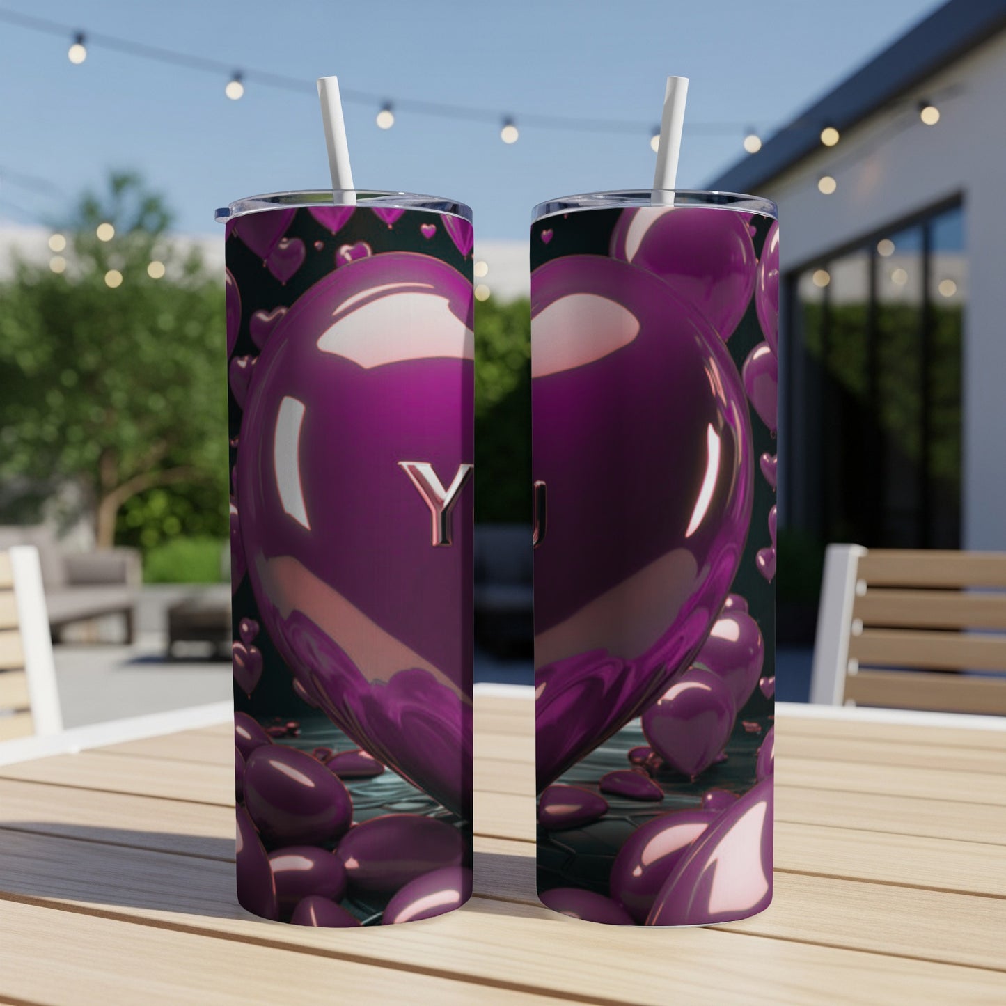 Two purple heart-shaped tumblers with "You" embossed on one side.