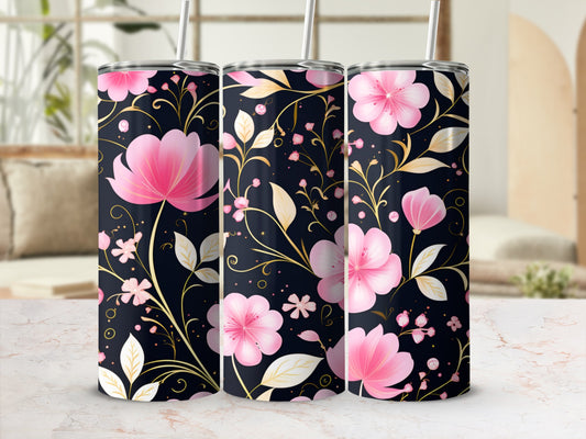 Three tumblers with pink flowers and gold leaves on a dark background.