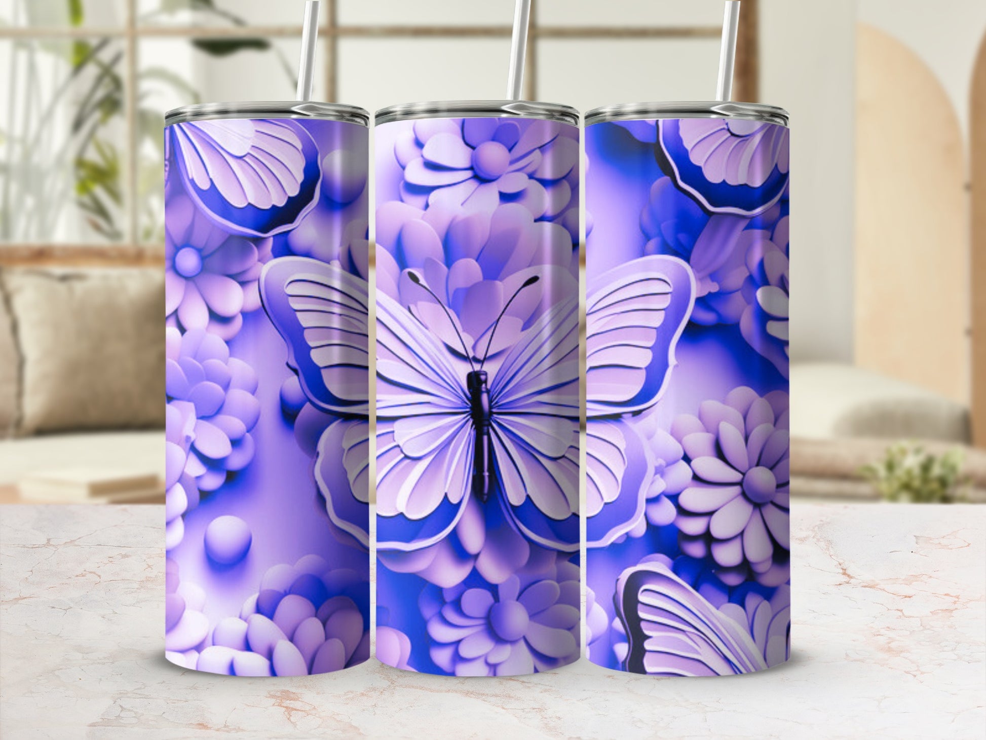 Purple butterfly and floral patterned tumbler with straw.