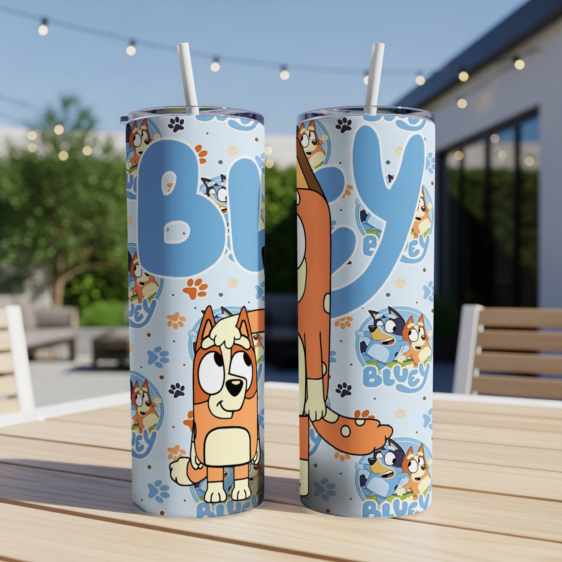 Bluey character design on a light blue patterned tumbler with straw.