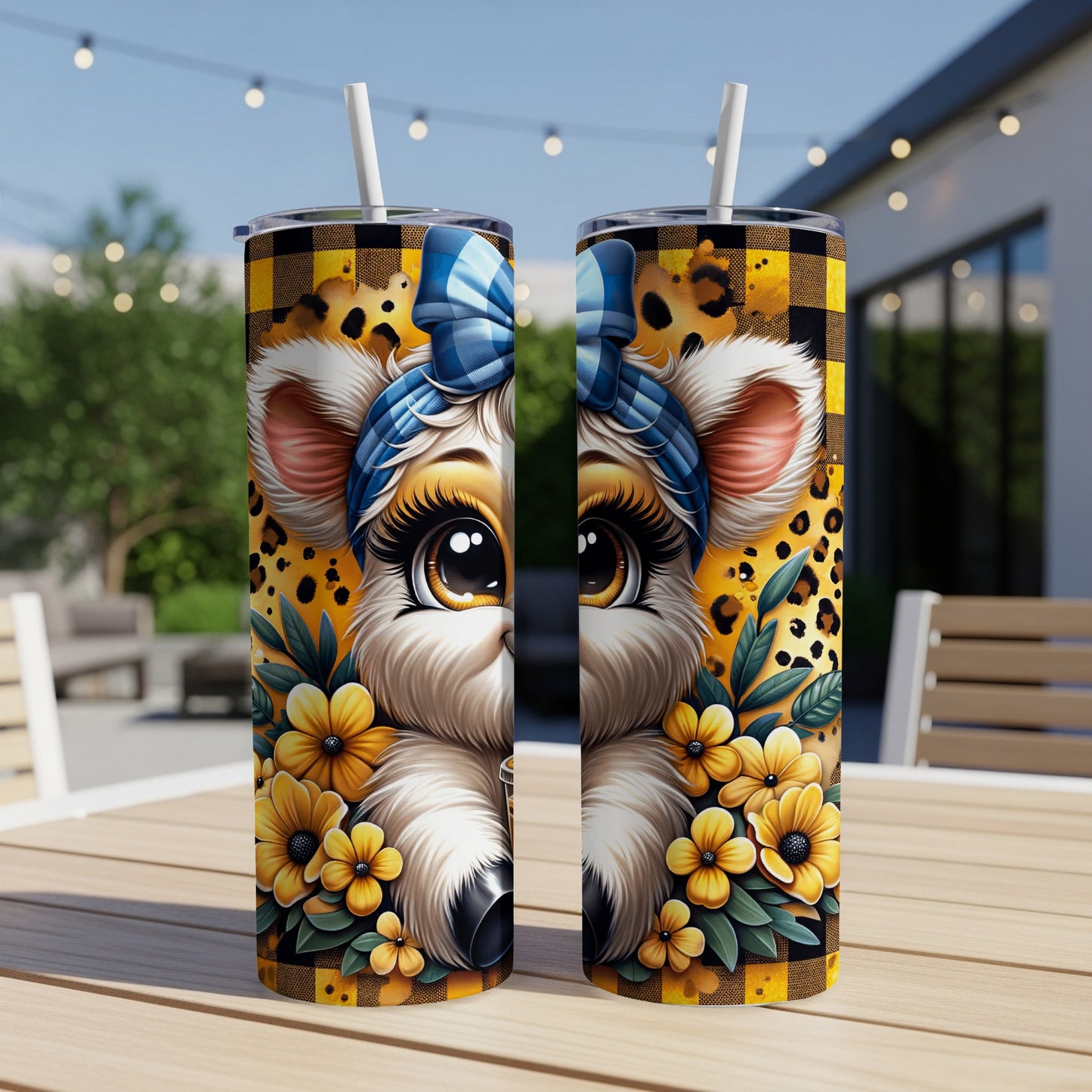 Two tumblers with a cow face design, yellow flowers, and leopard print.