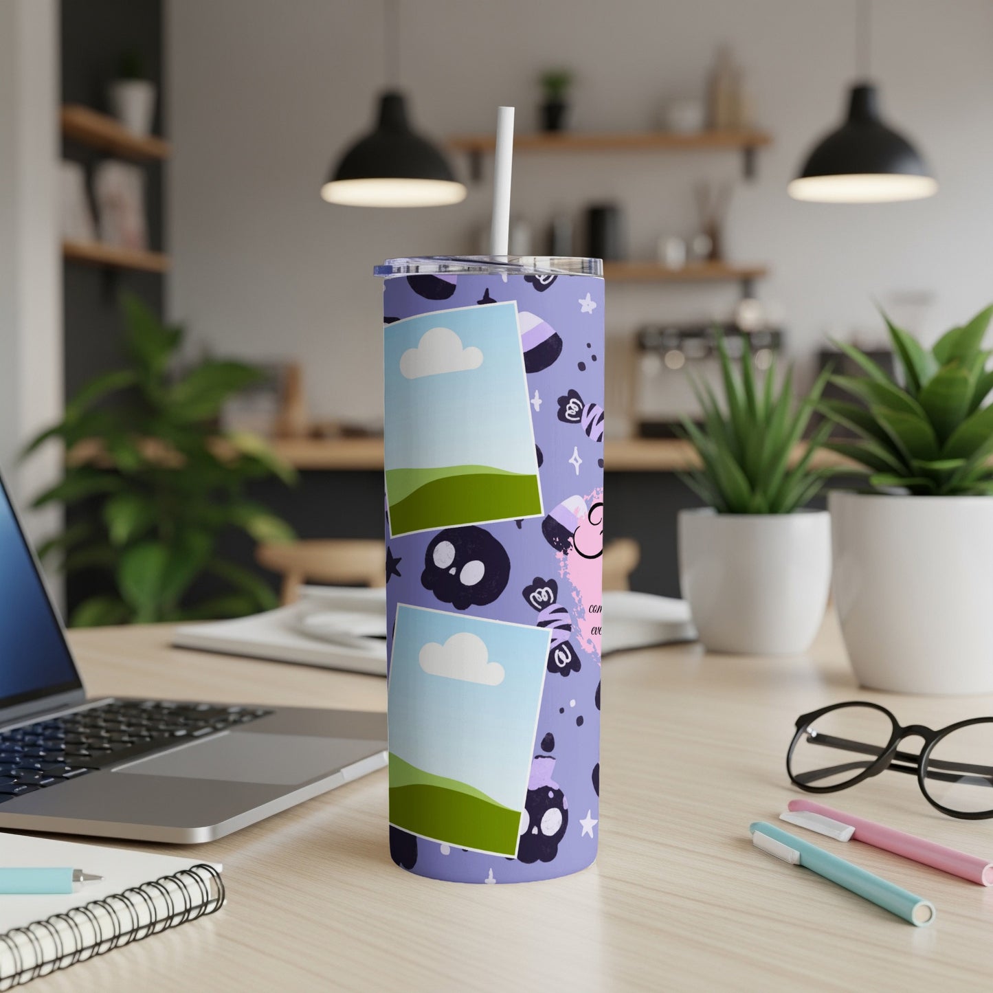 Purple tumbler with black skulls, stars, and candy illustration, featuring placeholder photos.