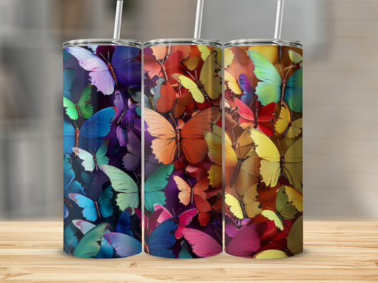 Three tumblers displaying colorful butterfly patterns.