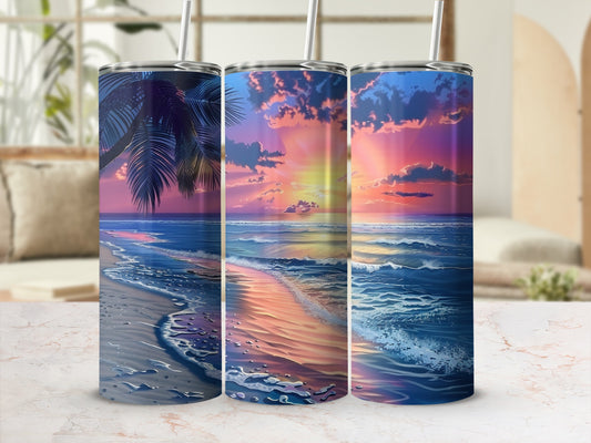 Three tumblers featuring a vibrant sunset over a sandy beach with ocean waves.