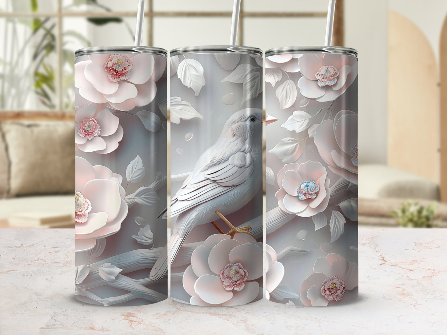 Three tumblers with a floral and bird design, rendered in pale pink and white.