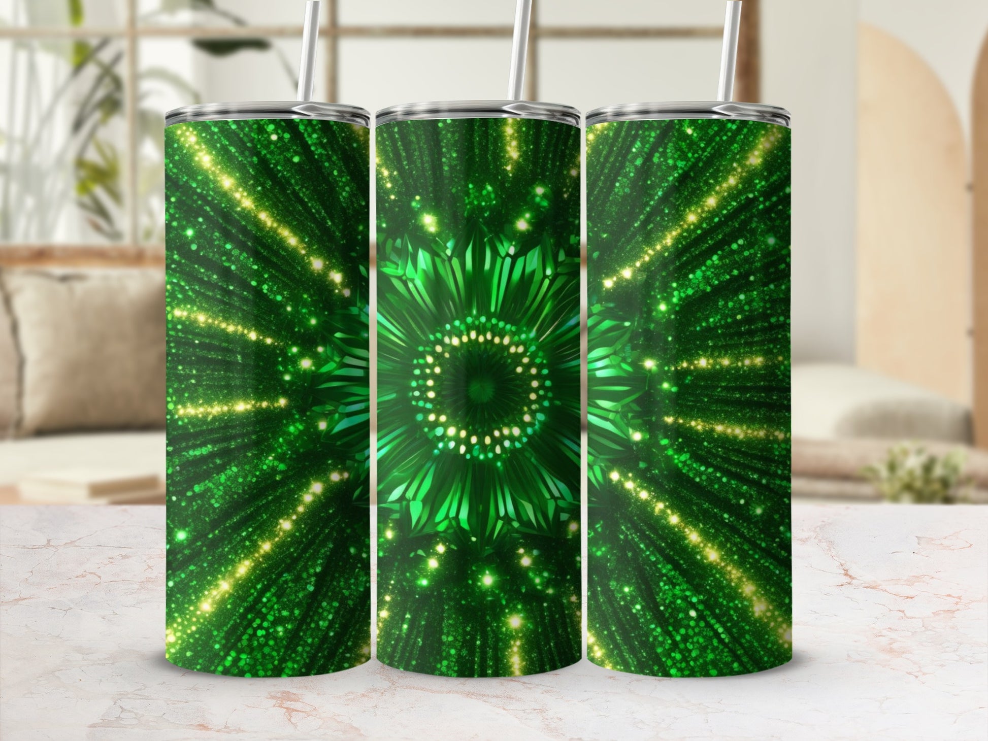 Green glitter pattern with radiating golden light on three tumblers.