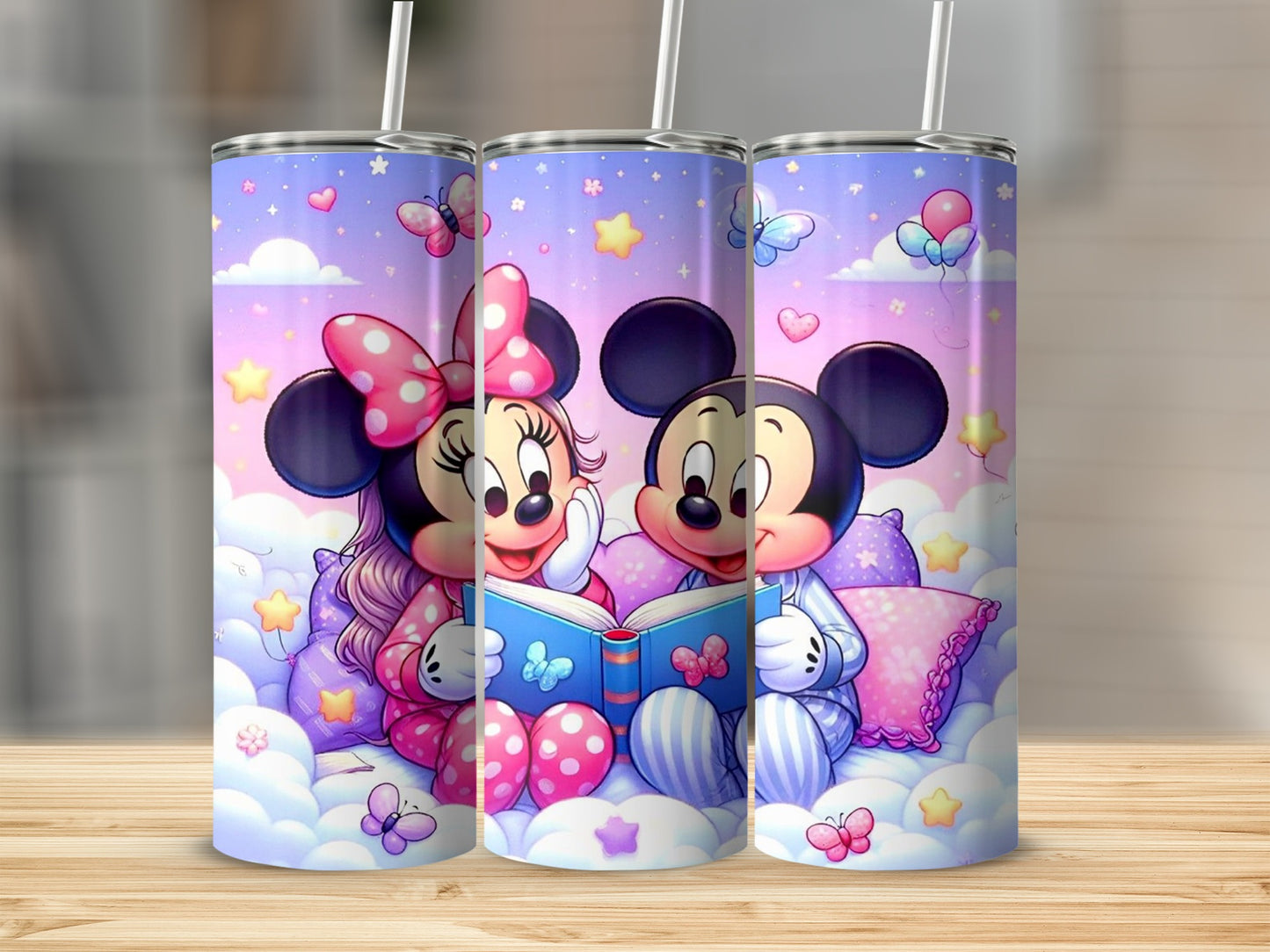 Mickey and Minnie Mouse in pajamas reading a book in clouds.