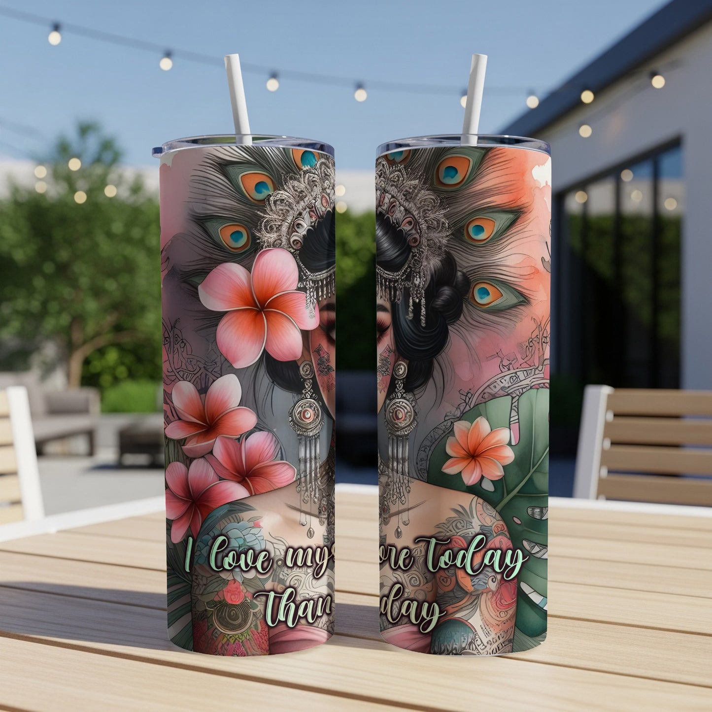 Two tumblers with ornate peacock feather and floral art, reading "I love my future today than yesterday."