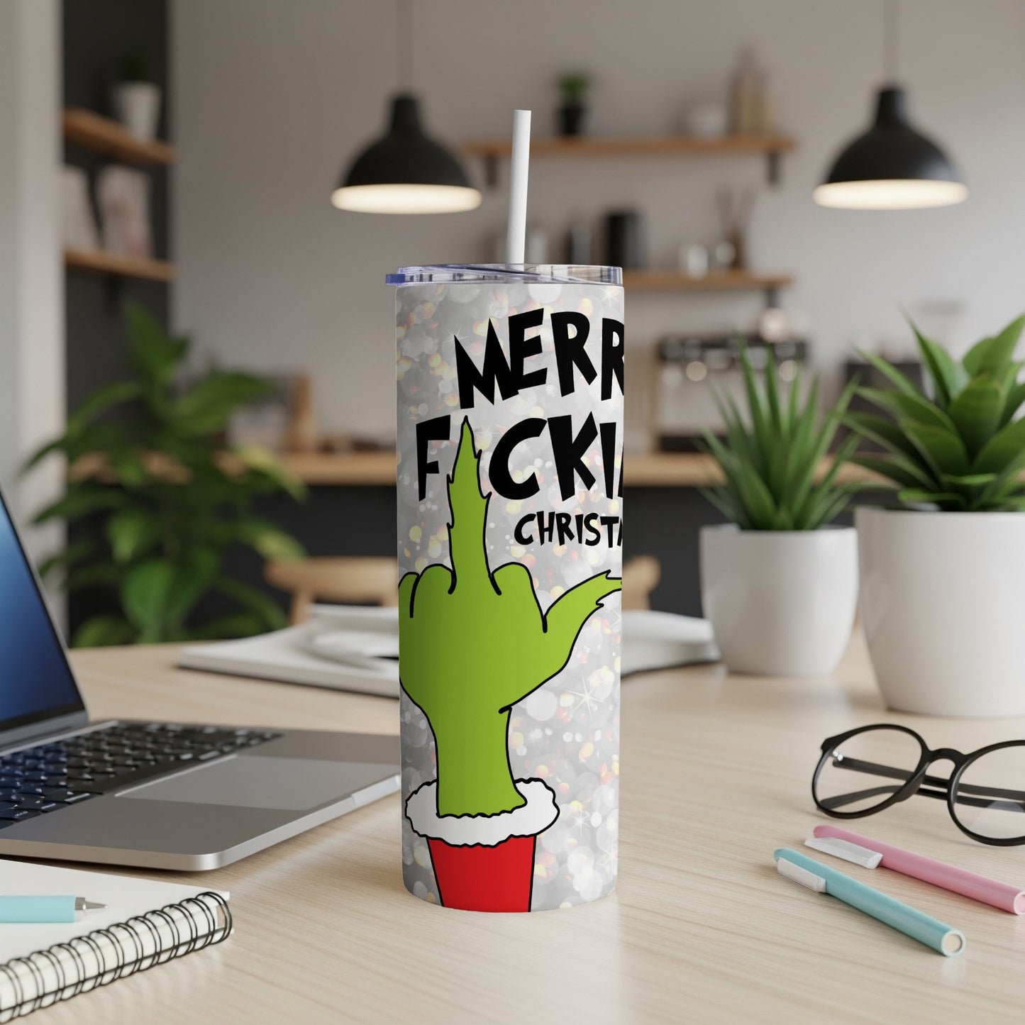 Green Grinch hand giving middle finger with "Merry F***ing Christmas" text on tumbler.