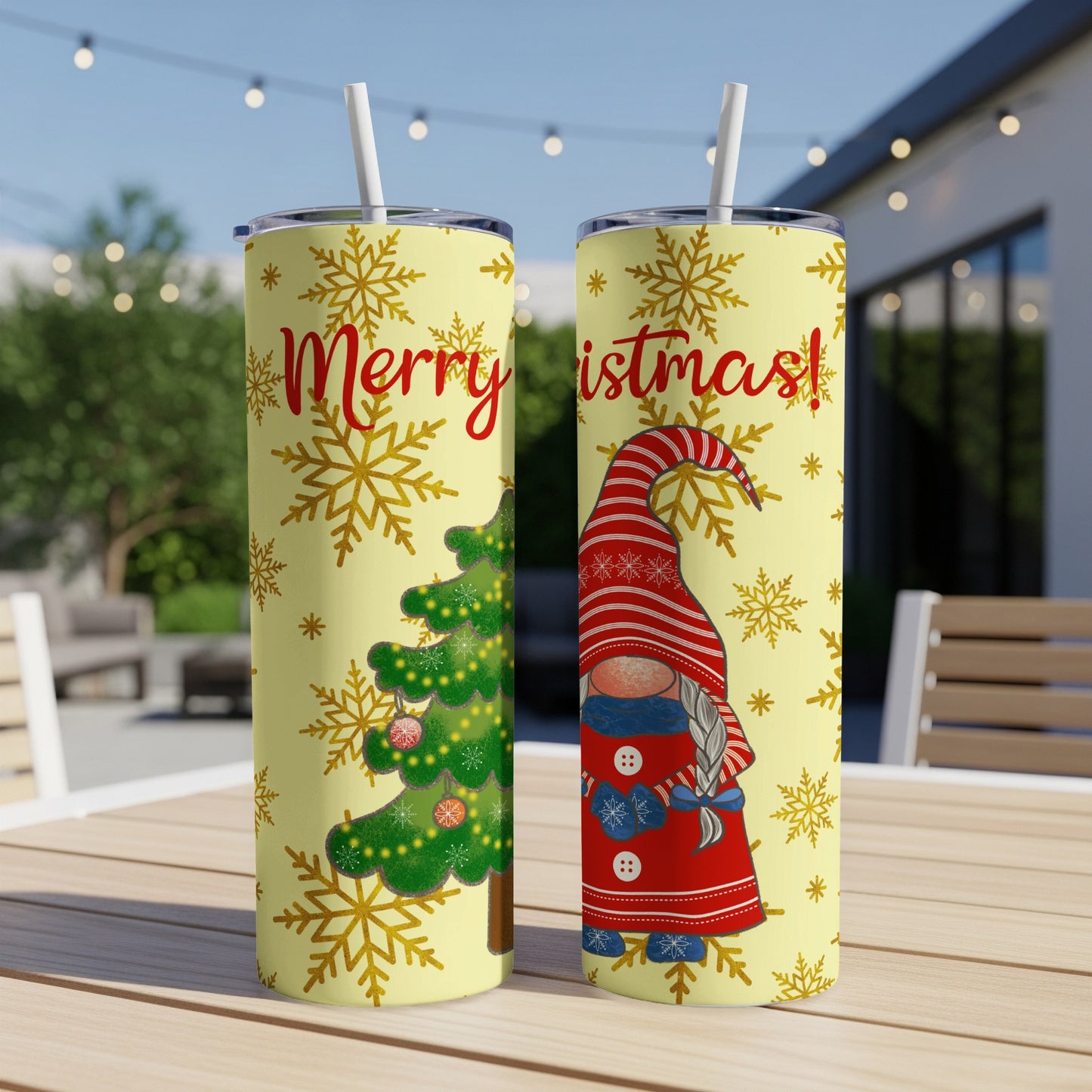 Yellow tumbler with Christmas tree and gnome design, "Merry Christmas" text.