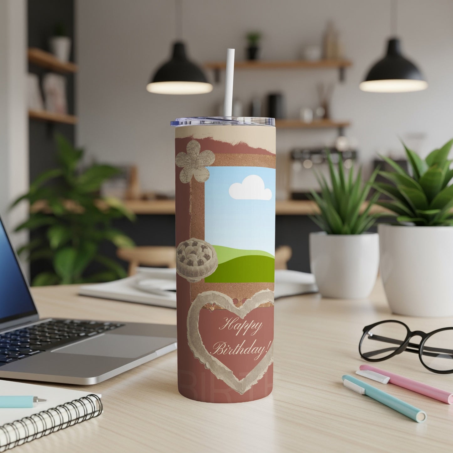 Tumbler with "Happy Birthday!" text inside a heart, featuring a landscape scene.