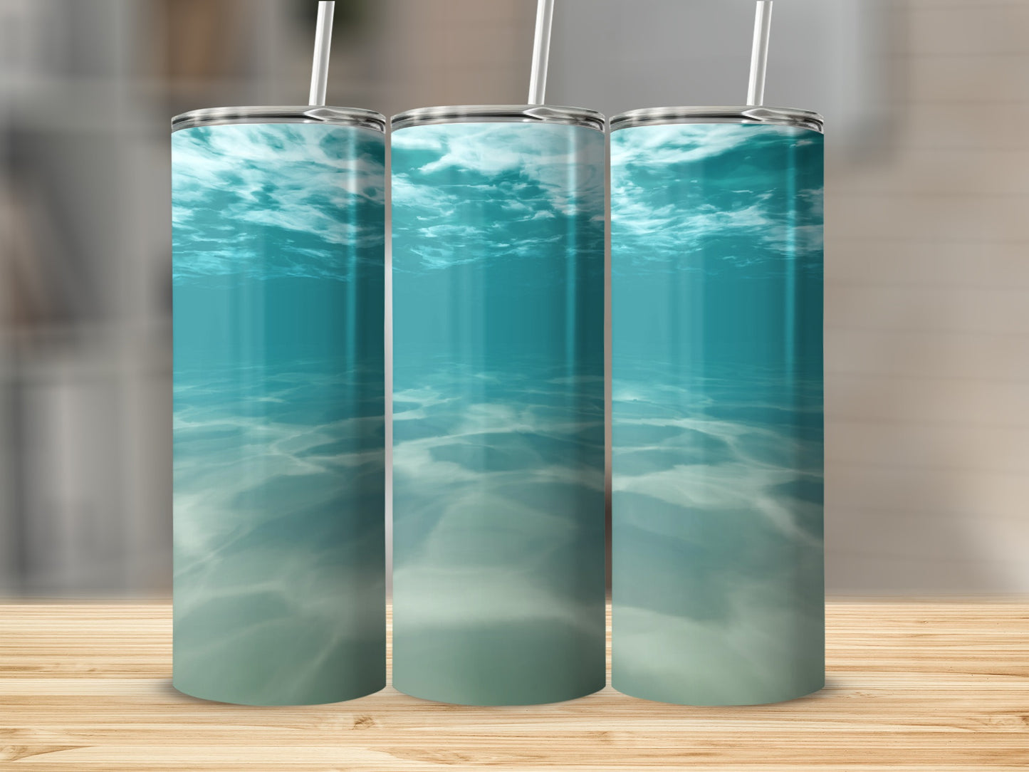Three tumblers with underwater ocean scene.