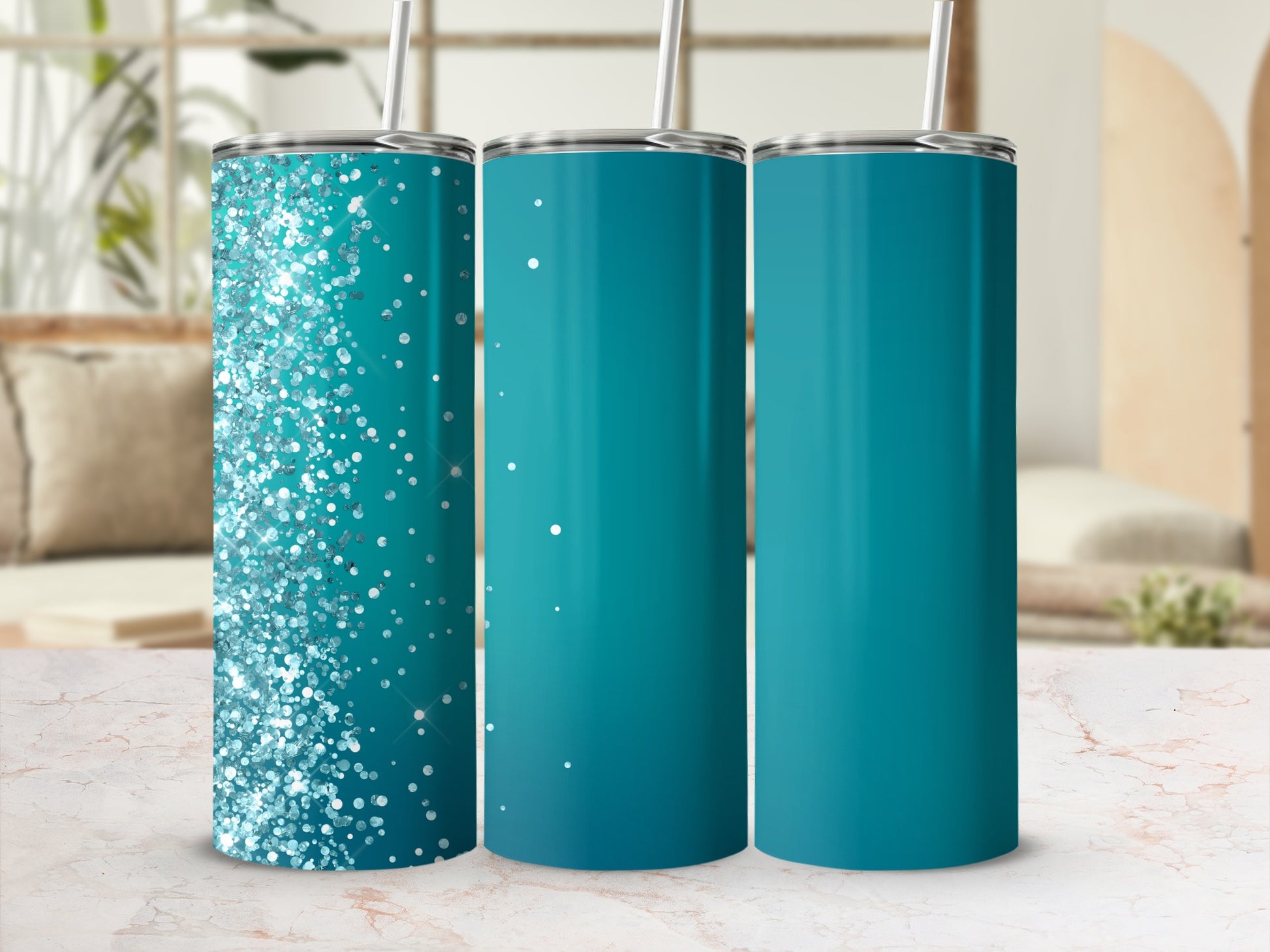 Three teal tumblers with straws; one with glitter, two solid.