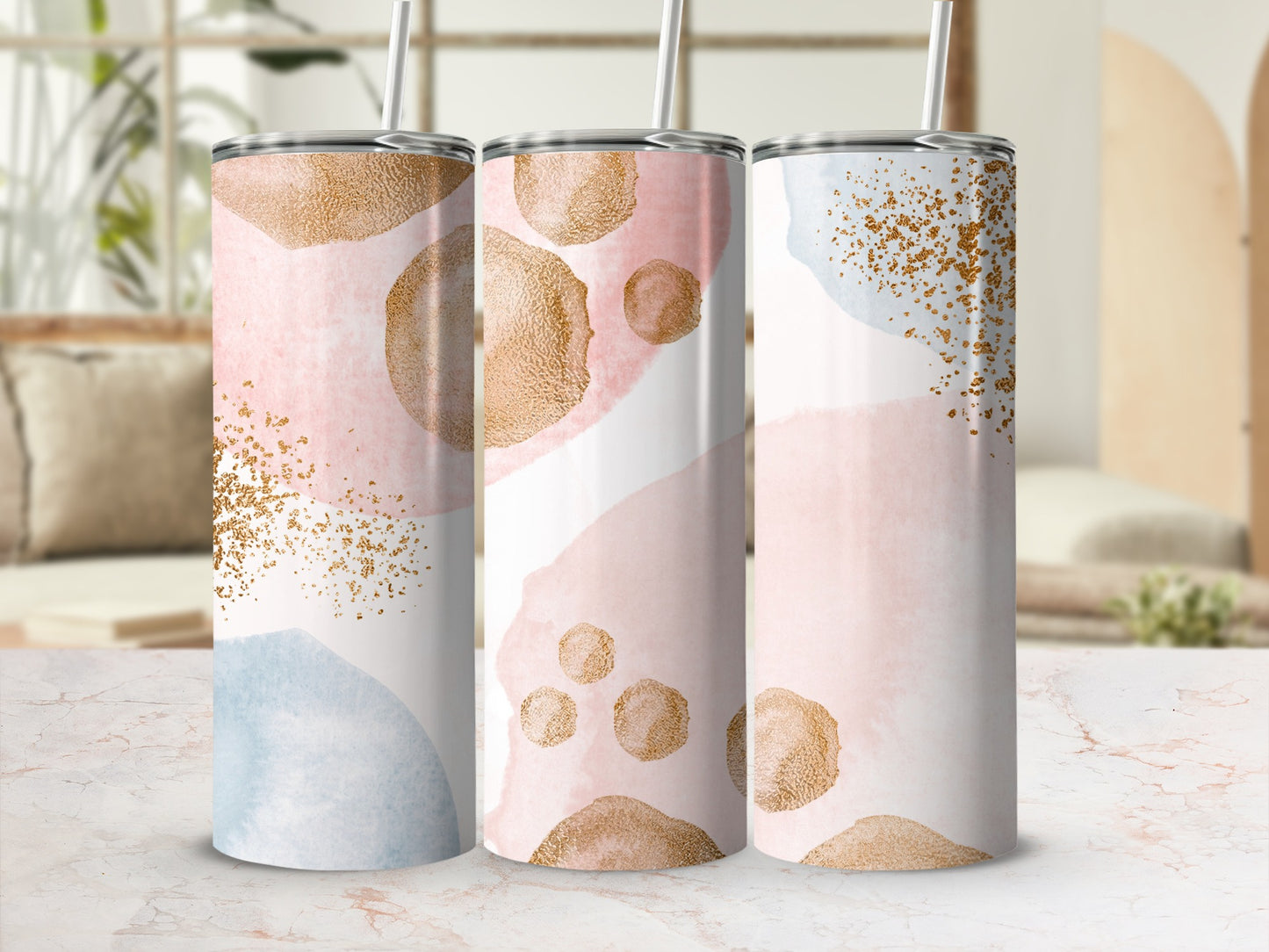 Three tumblers with a watercolor and gold speckle design.