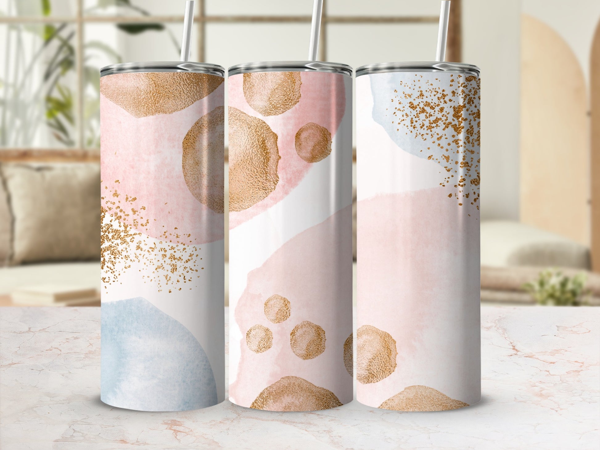 Three tumblers with a watercolor and gold speckle design.