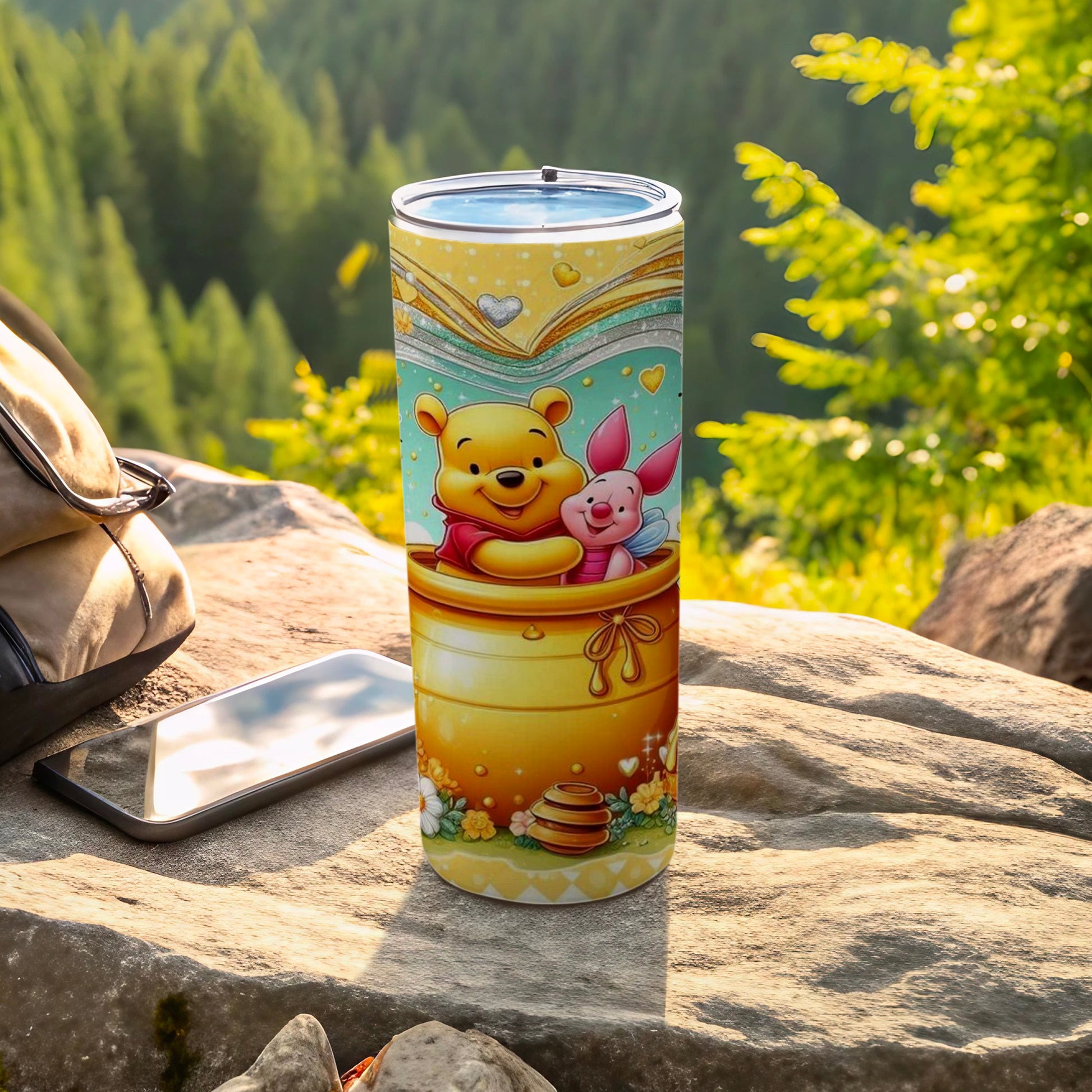 Winnie the Pooh and Piglet in a honey pot, on a travel tumbler.