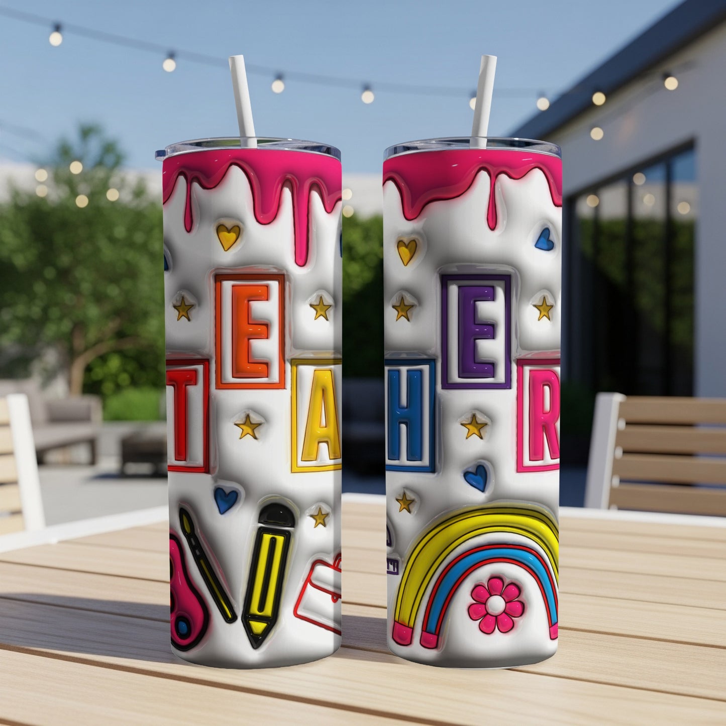 Tumbler with "Teacher" text, art supplies, and rainbow design.