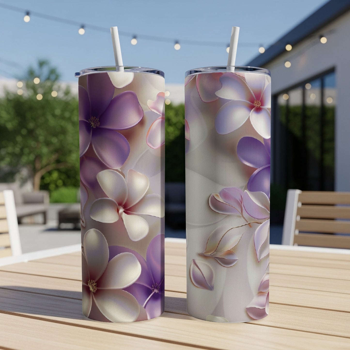 Two tumblers with a purple and white floral design.