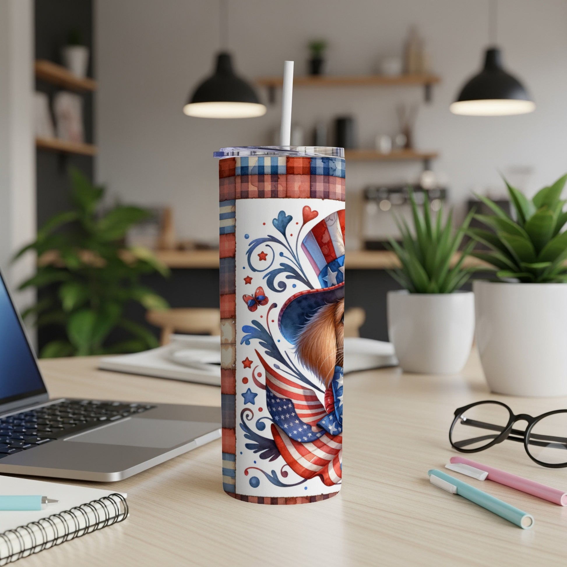 Fourth of July themed tumbler with patriotic stars, stripes, and a dog in a hat.