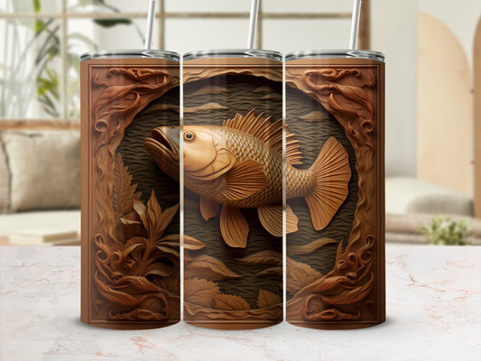 Brown wood-carved tumbler with a bass fish relief on a marbled surface.