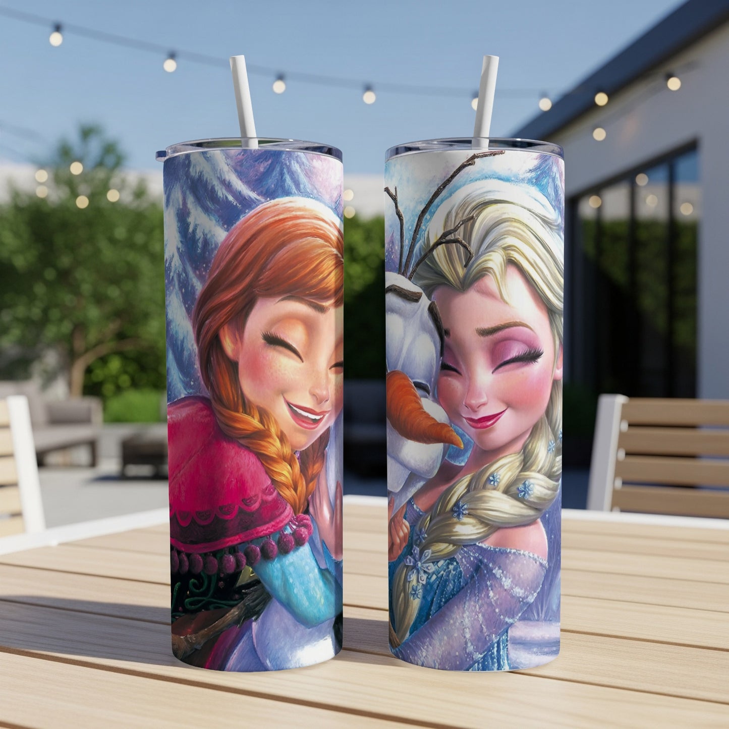 Anna and Elsa from Frozen with Olaf on a tumbler.