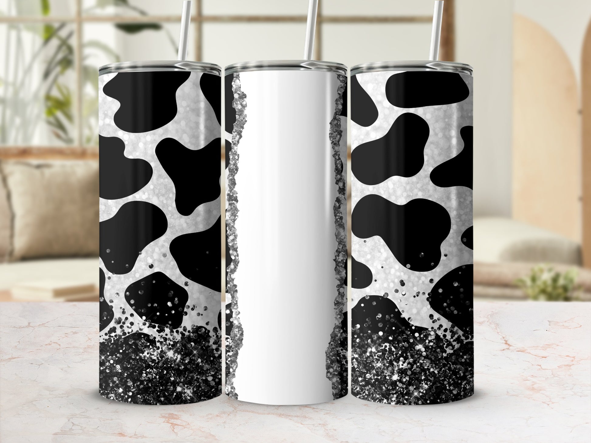 Triptych of tumblers with cow print and glitter accents.