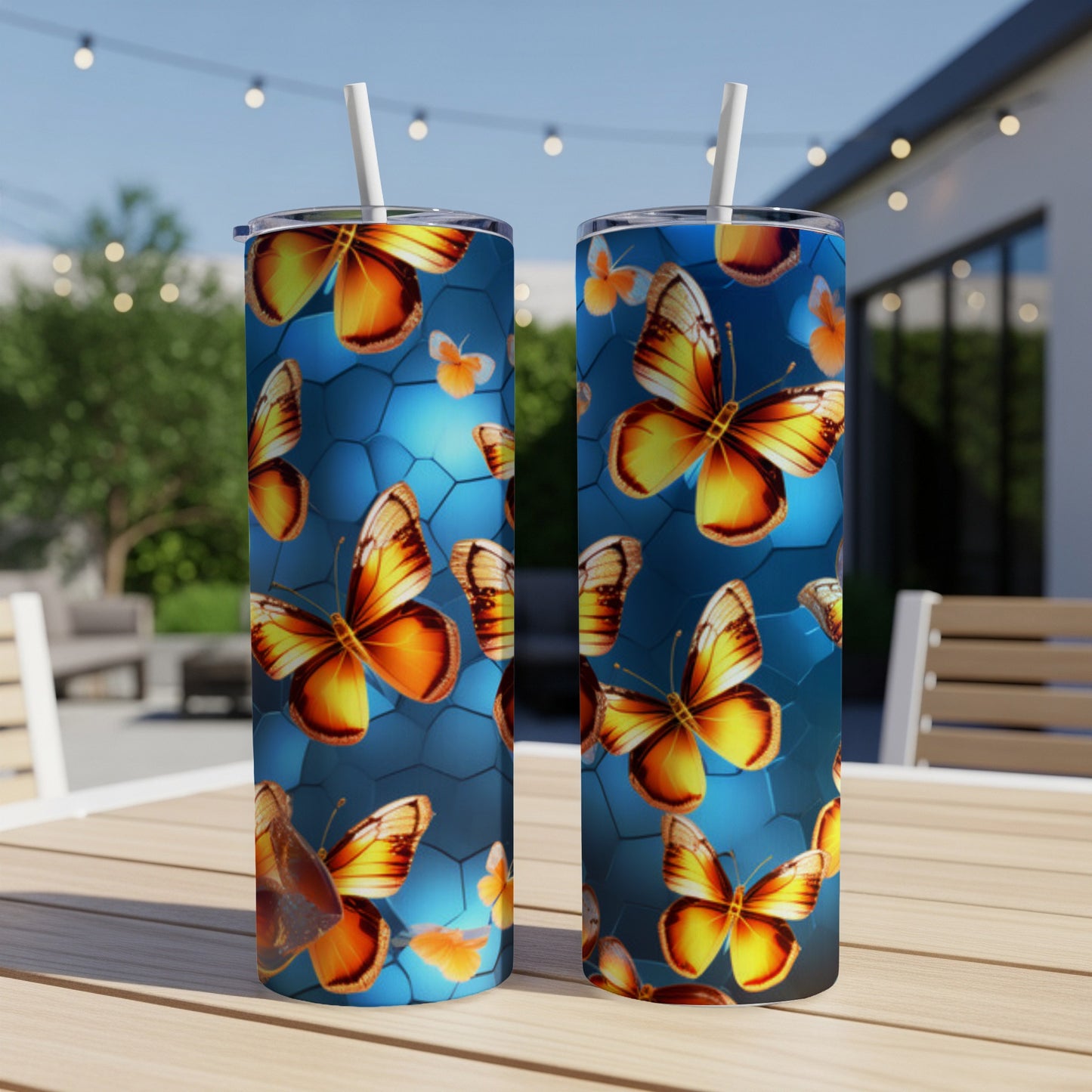 Two tumblers with orange butterflies and blue honeycomb pattern.
