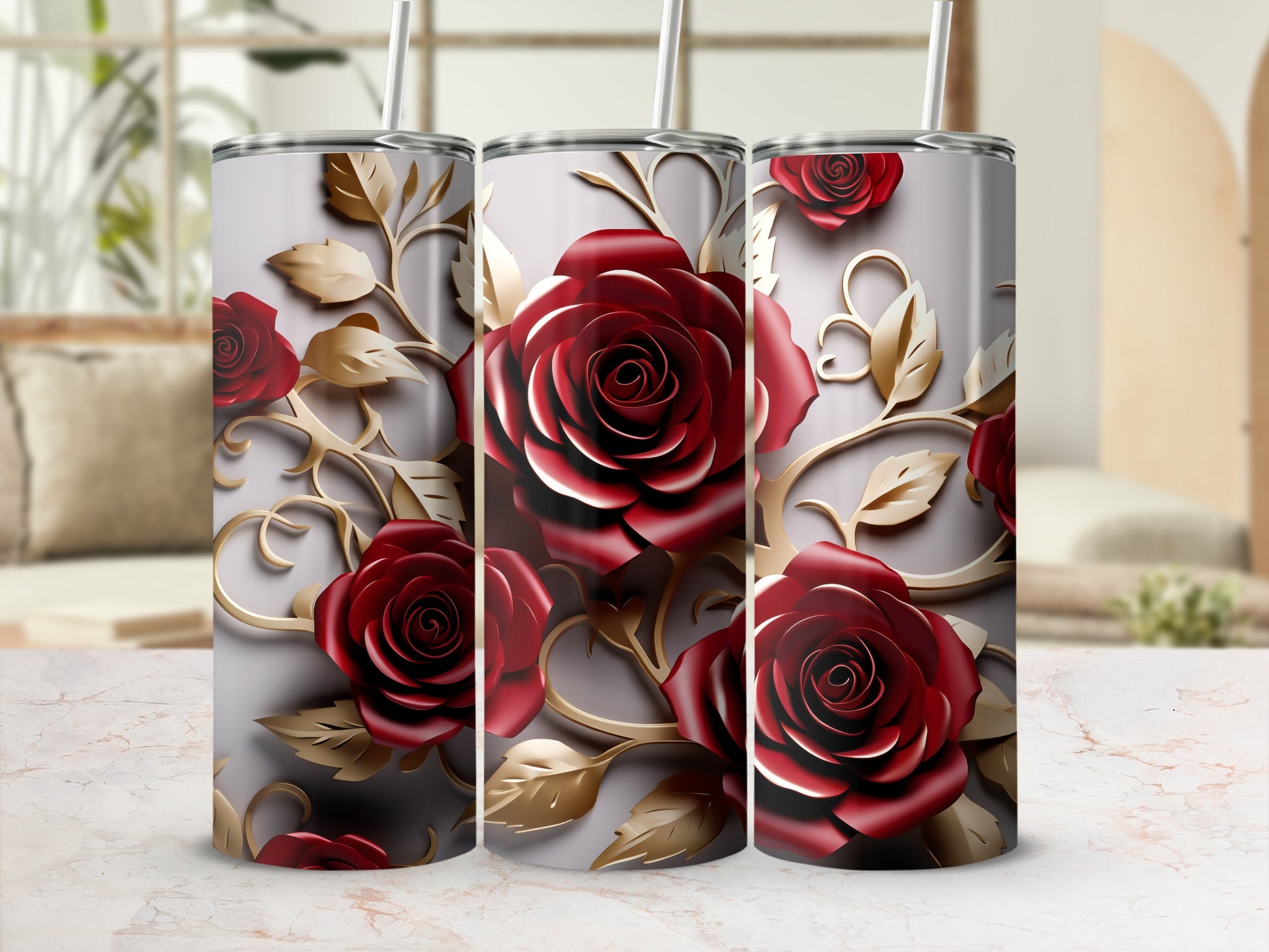 Three tumblers with red roses and gold floral accents.