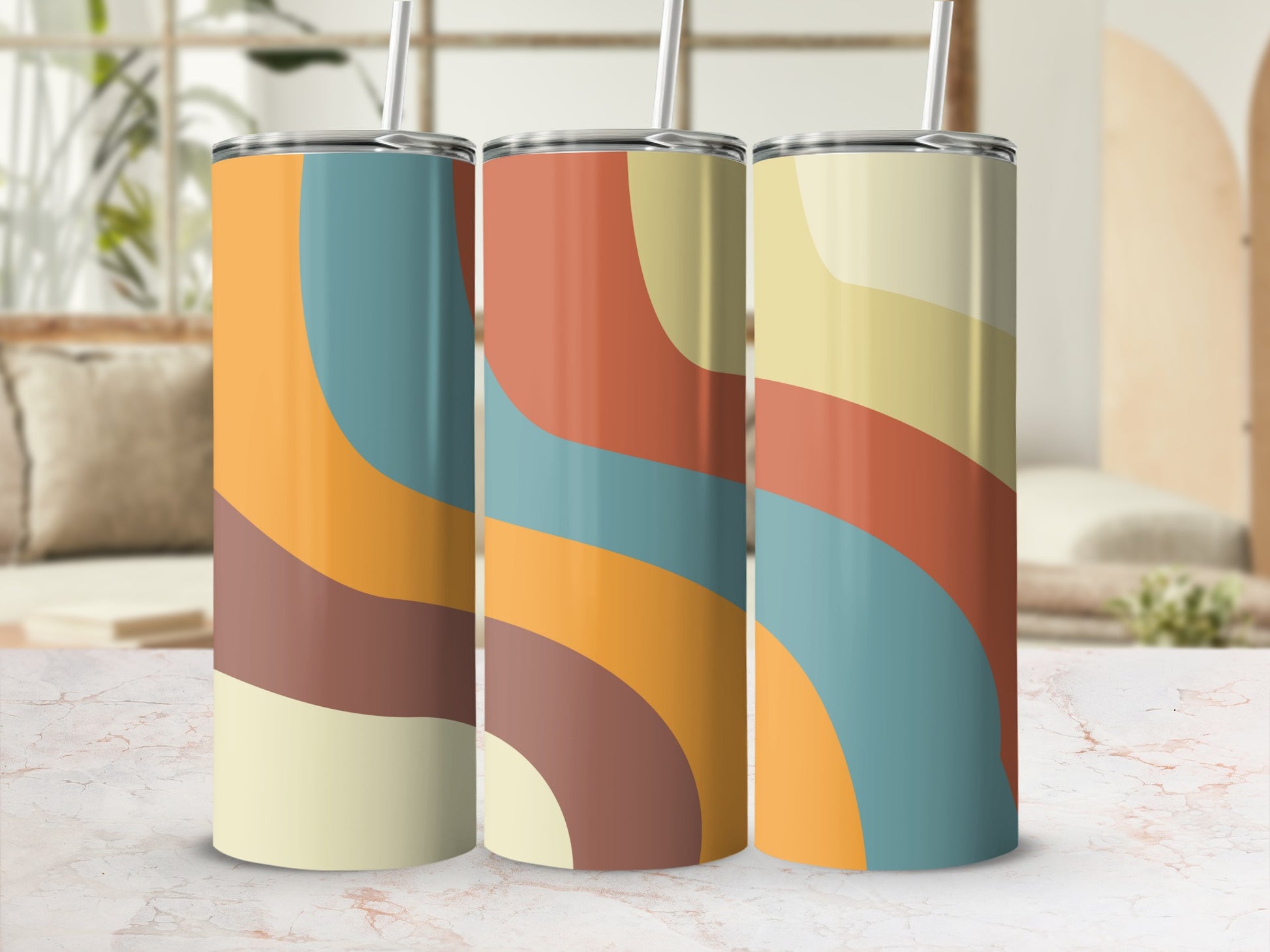 Three tumblers with retro-inspired wavy block patterns in cream, orange, teal, and brown.