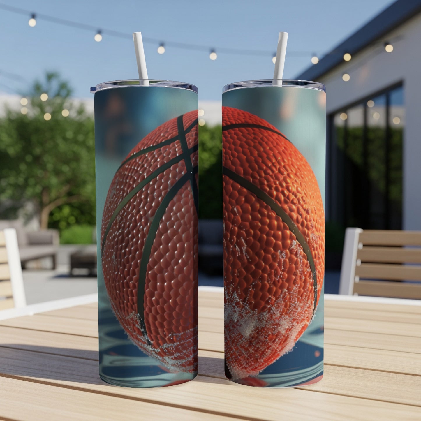 Two tumblers with a close-up basketball design on a wooden table.