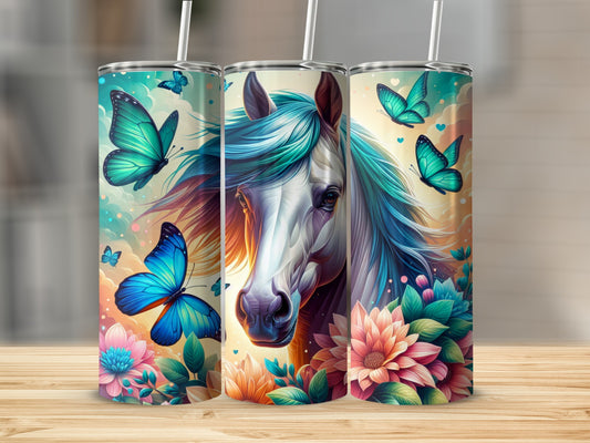 Horse and butterflies on a teal tumbler with floral accents.
