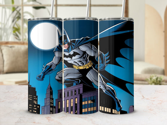 Batman perched on a building ledge with a city skyline and moon behind.