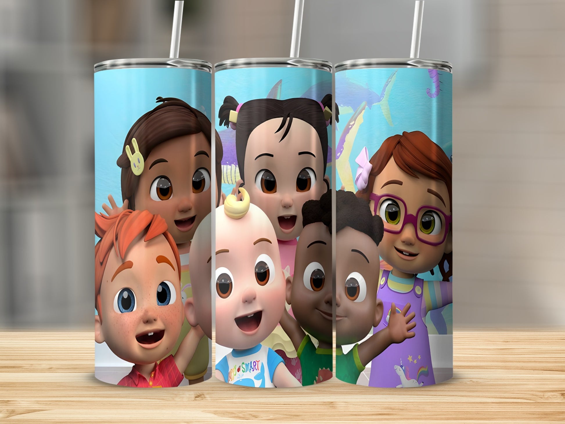 Cocomelon characters on a tumbler with straw.
