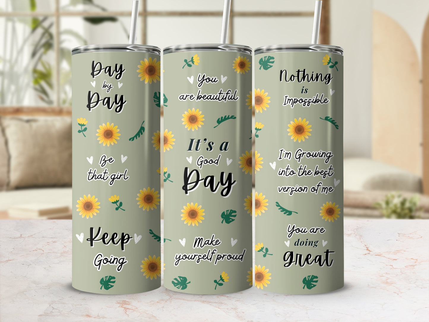 Three mint green tumblers with floral and inspirational text designs.