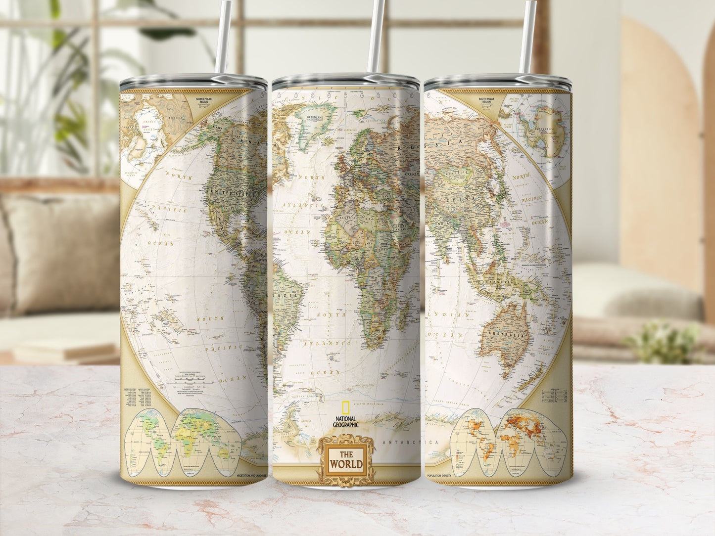 Three tumblers wrapped in a National Geographic world map design.