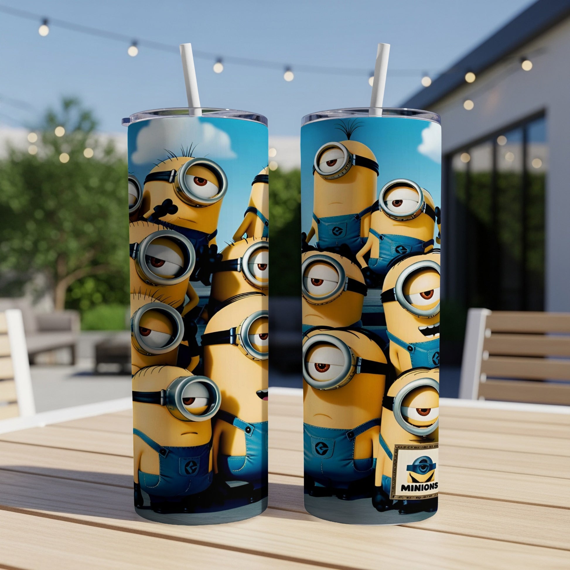 Minions characters in denim overalls on two tumblers with straws.