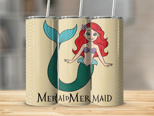 Ariel mermaid illustration on a patterned tumbler with a straw.