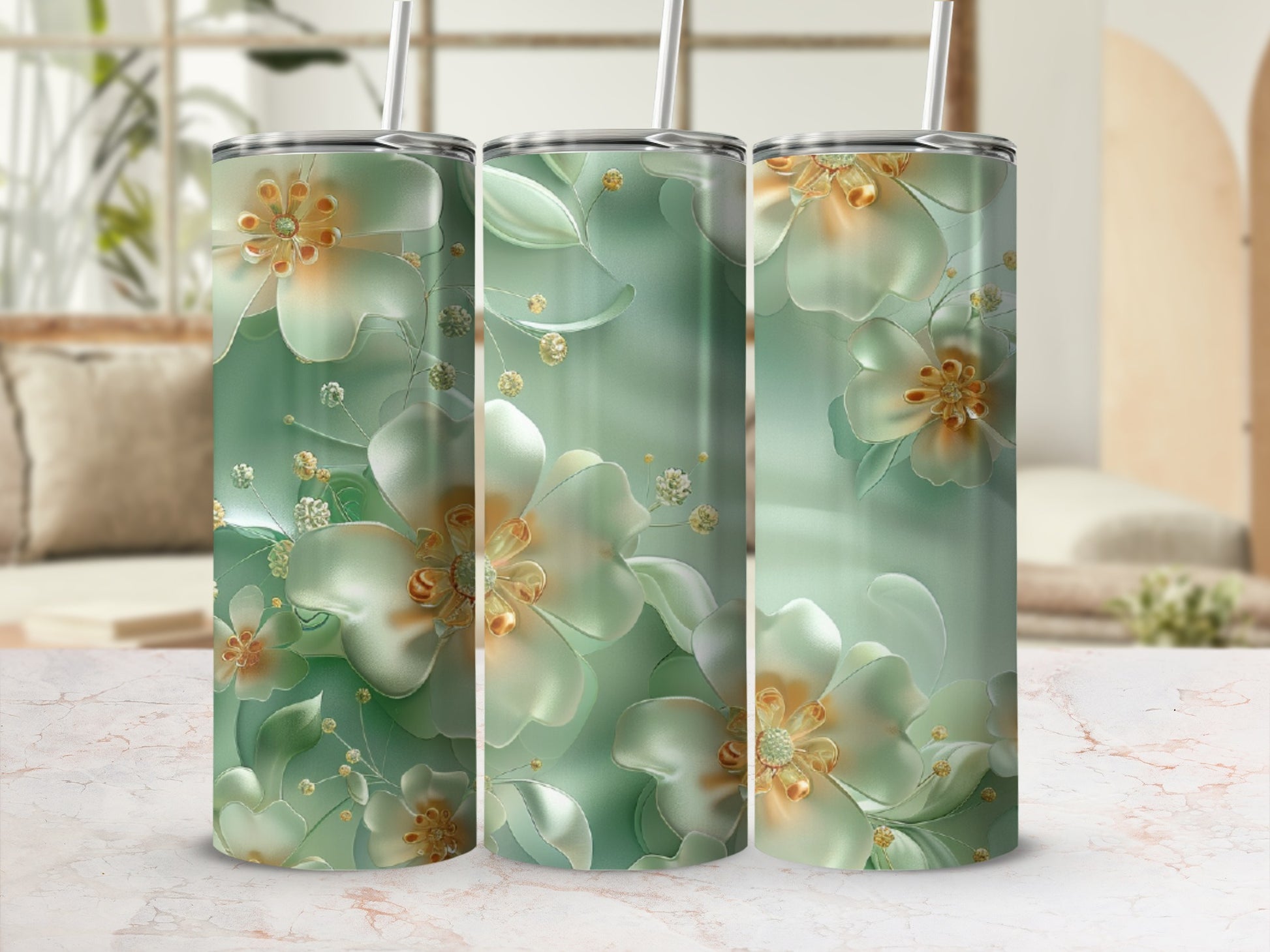 Three mint green tumblers with iridescent floral designs and gold accents.