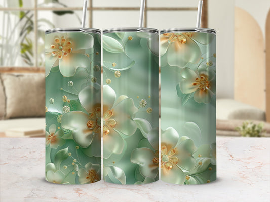 Three mint green tumblers with iridescent floral designs and gold accents.