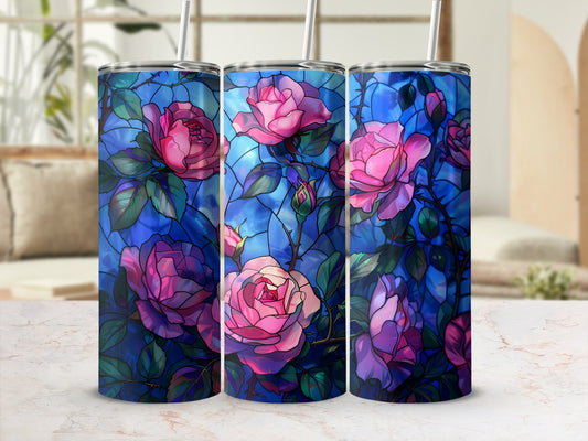 Three tumblers with a stained-glass rose pattern on a marble surface.