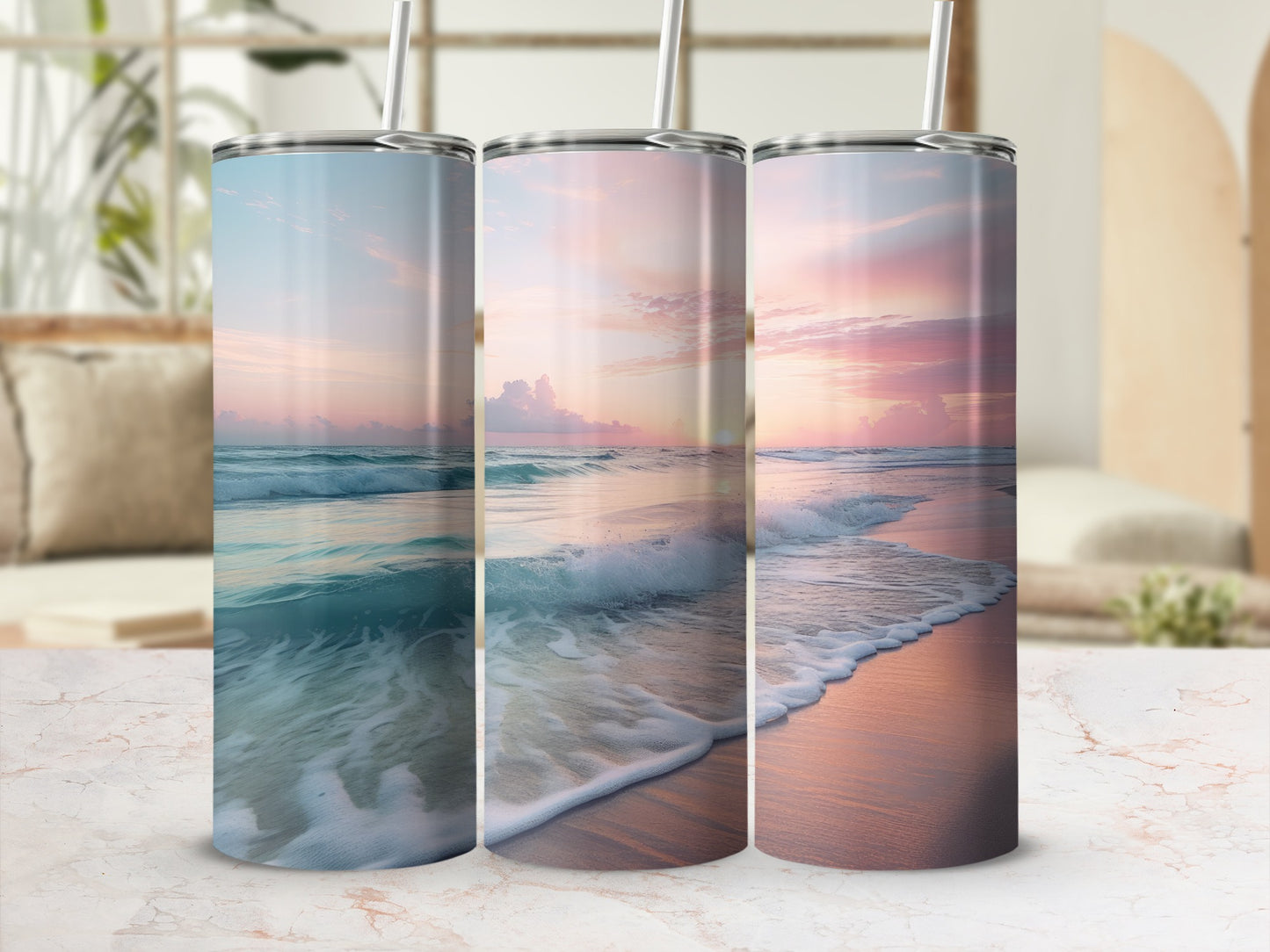 Three tumblers with a beach sunset design.