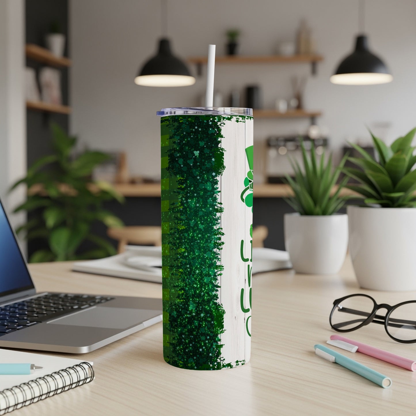 Green speckled tumbler with shamrock and St. Patrick's Day text.