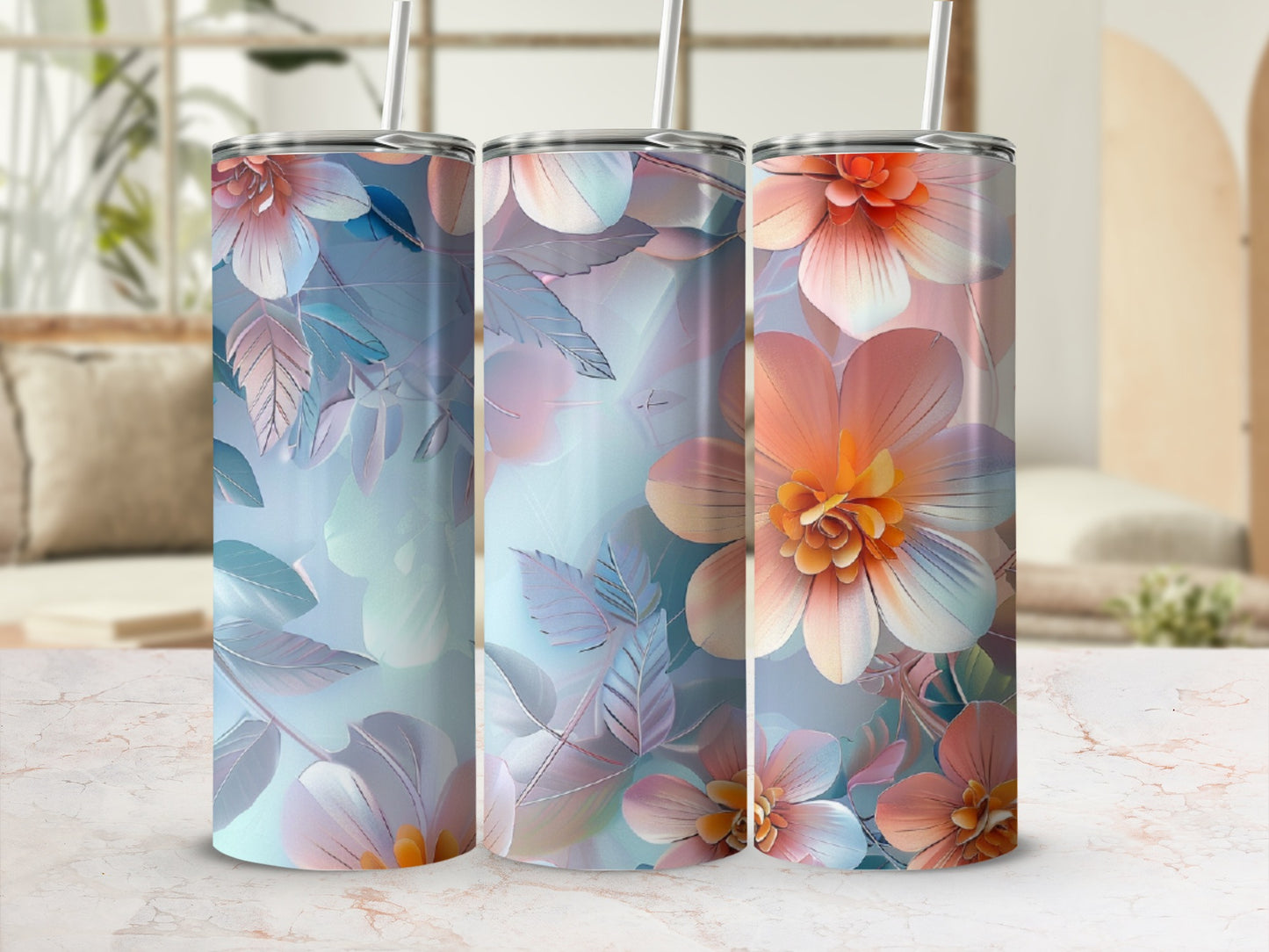 Three tumblers with floral designs, featuring peach and blue petals and leaves.