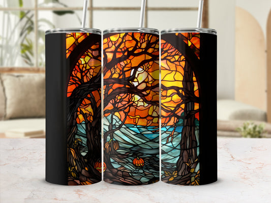 Black tumbler with autumn stained glass scene and pumpkins.